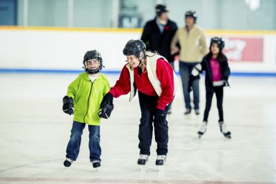Decorative cover photo for the City of Mississauga Skating Volunteers program. Shown is a mother an child skating.