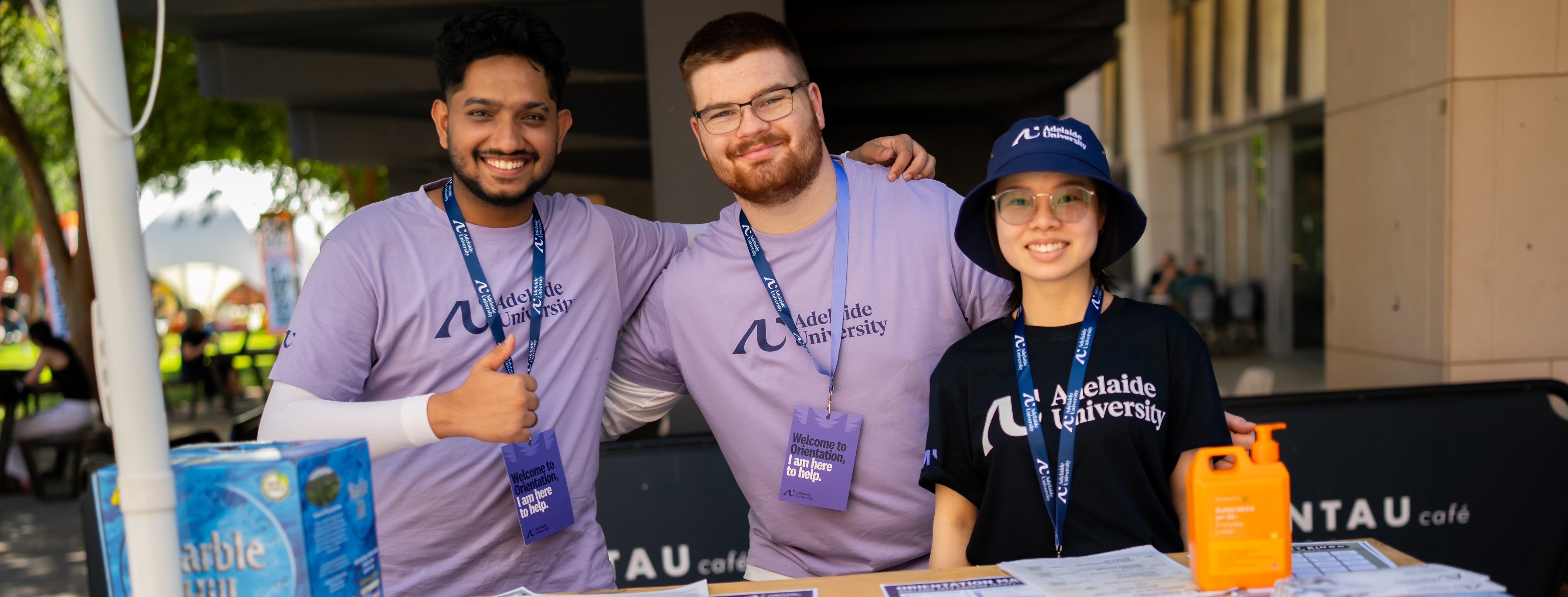Student and staff volunteers helping at orientation